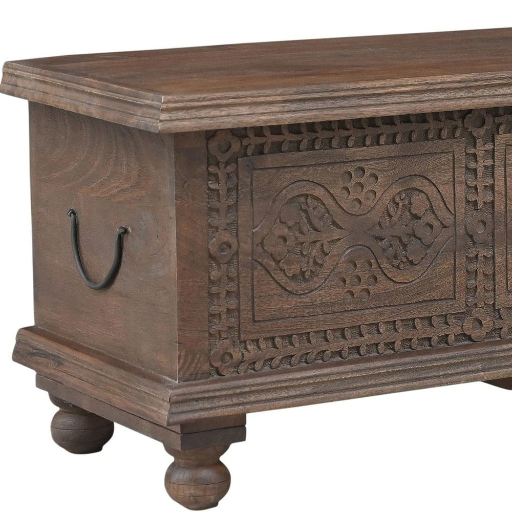 54" Brown Solid Wood Medallion Ottoman With Storage. Ottoman isolated on a plain white background, finished in brown wood.