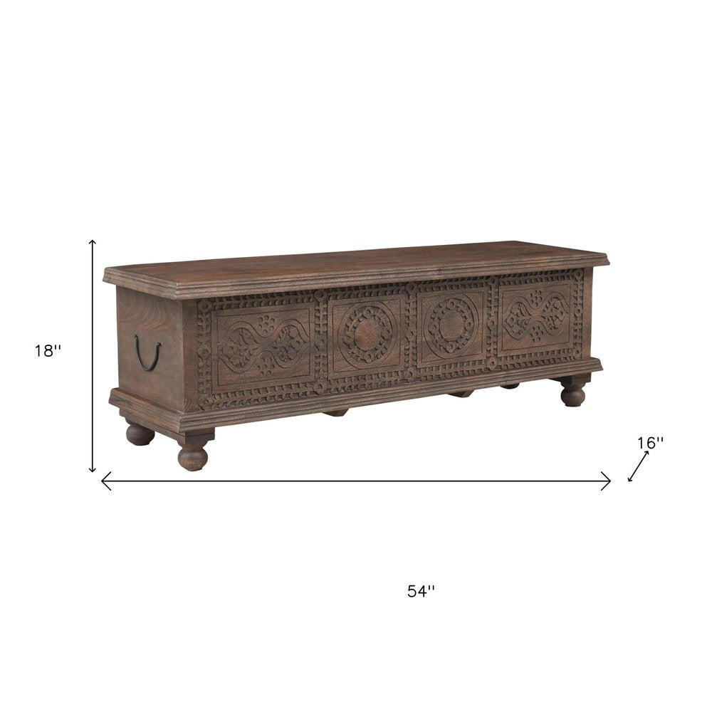 54" Brown Solid Wood Medallion Ottoman With Storage. Ottoman isolated on a plain white background, showing a brown wood surface.