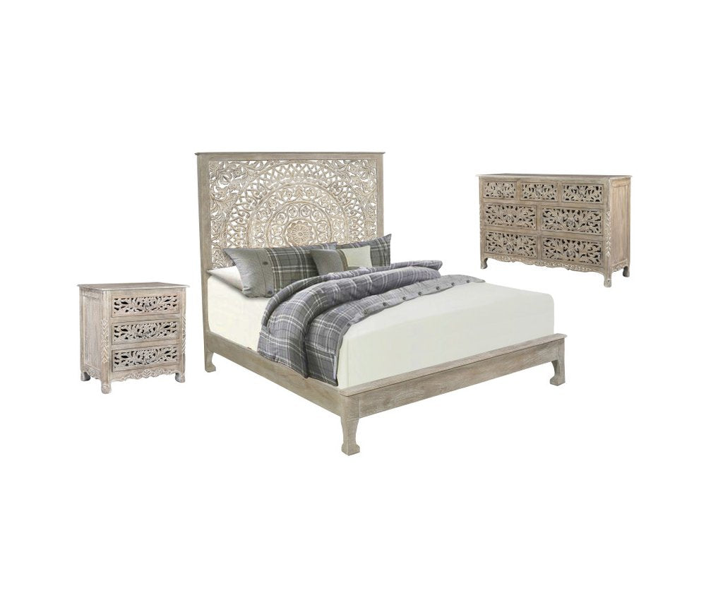 Three-piece gray solid wood bedroom set with carved detailing, including a bed, nightstand, and dresser, on a white background.
