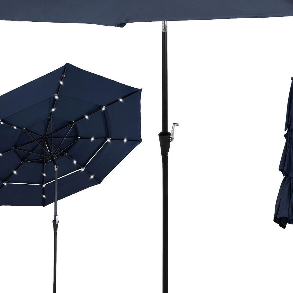10' Dark Blue Polyester Octagonal Tilt Lighted Market Patio Umbrella. Outdoor umbrella isolated on a plain white background, finished in blue fabric.