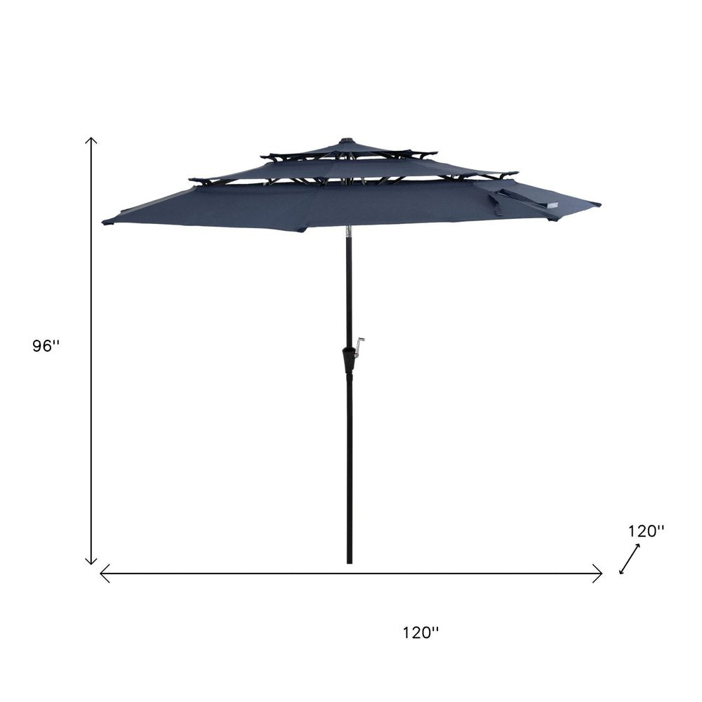 10' Dark Blue Polyester Octagonal Tilt Lighted Market Patio Umbrella. Outdoor umbrella isolated on a plain white background, finished in blue fabric.