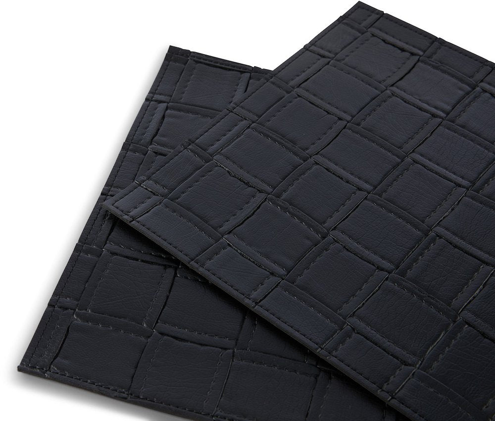 18" Set of Four Black Basketweave Faux Leather Placemats. Dining linen isolated on a plain white background, showing a black faux leather surface.