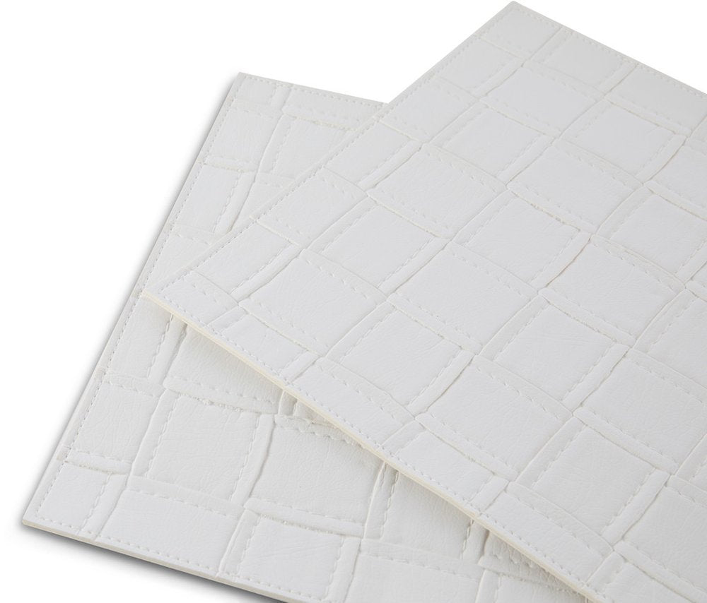 18" Set of Four White Basketweave Faux Leather Placemats. Dining linen isolated on a plain white background, showing a white faux leather surface.