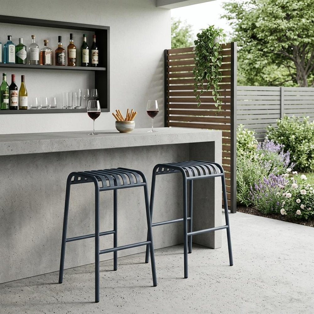 Set of Two 30" Dark Blue Steel Backless Bar Height Bar Chairs in a home interior