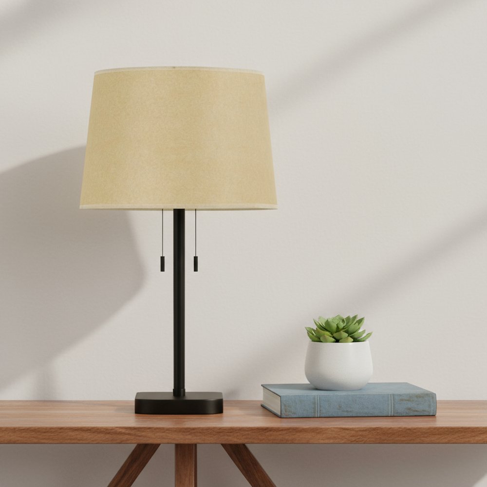 Tan Paper Plain Drum Lamp Shade in a home interior