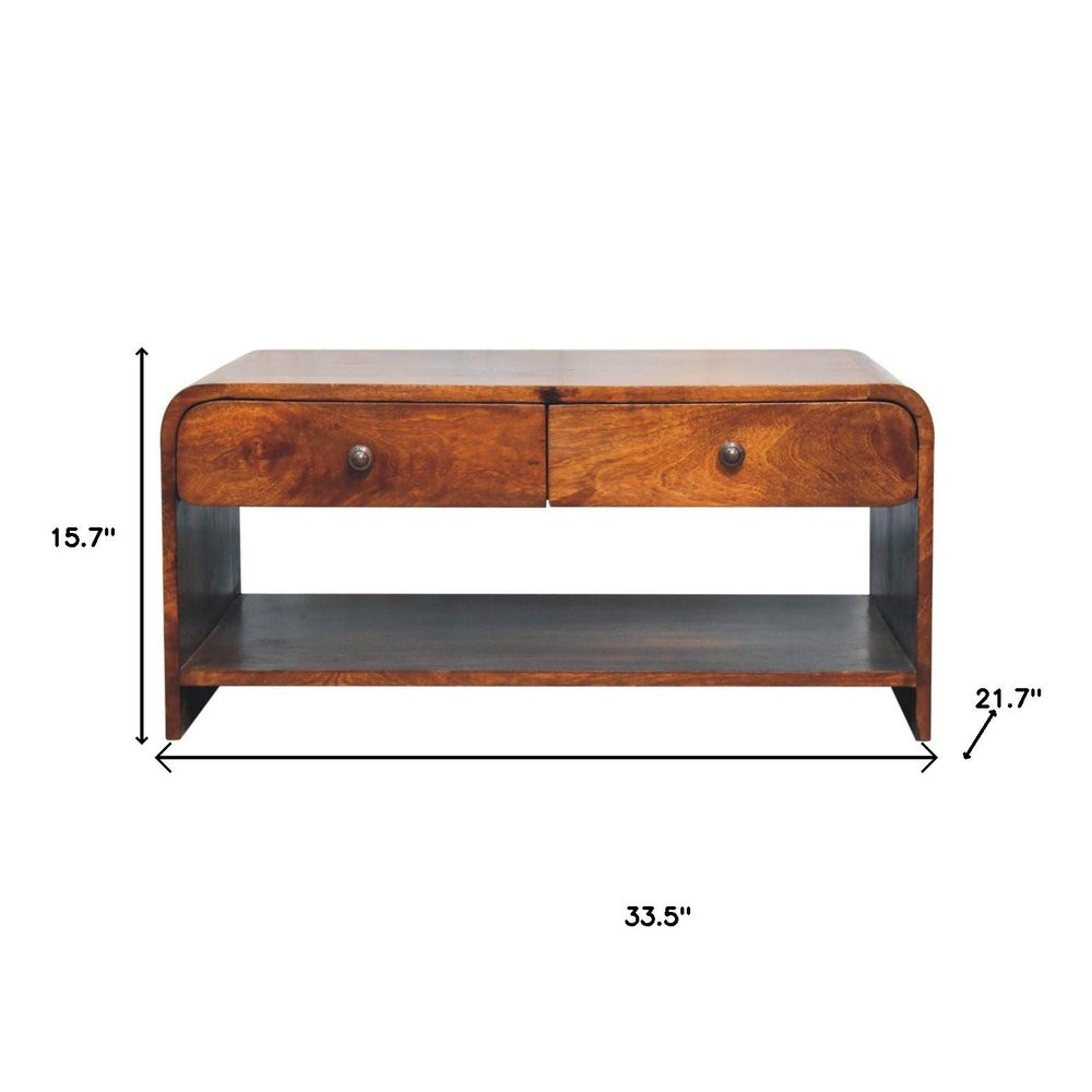 A wooden coffee table with two drawers and a lower shelf, measuring 33.5" wide, 15.7" high, and 21.7" deep.