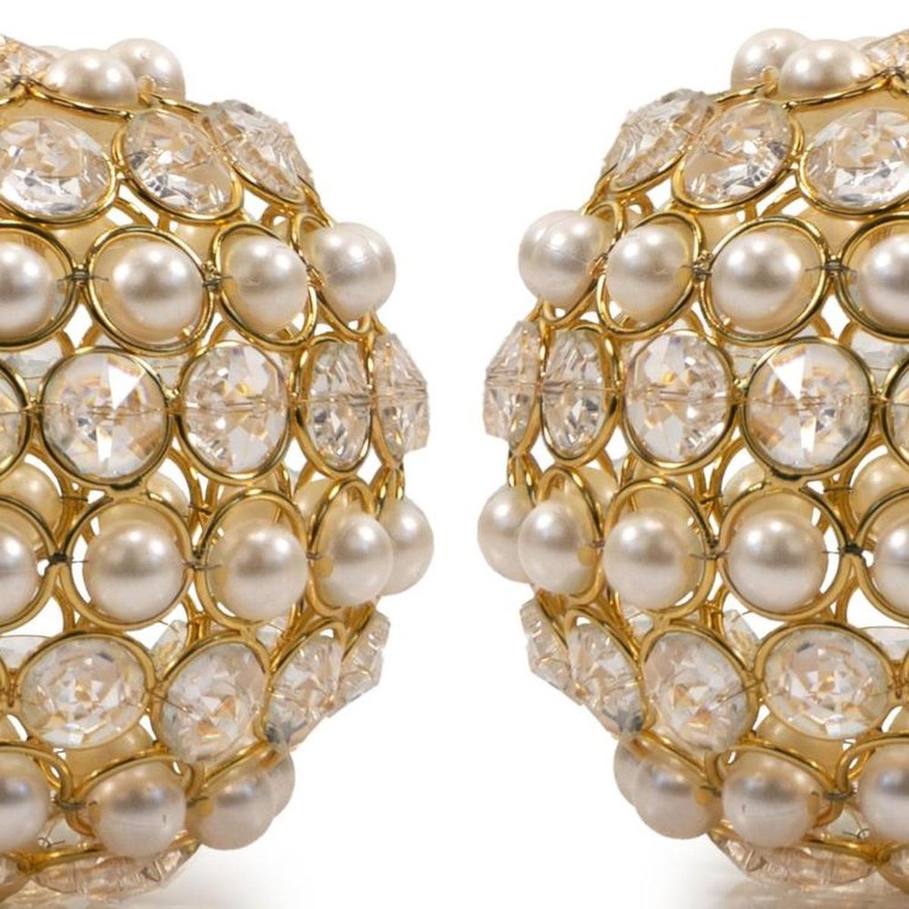 Set of Two Gold And Pearl Faux Crystal And Metal Decorative Orbs on a white background