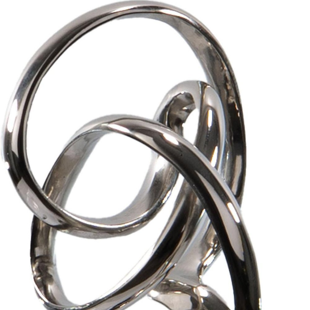 20" Silver And Black Aluminum And Marble Modern Abstract Tabletop Sculpture. Sculpture isolated on a plain white background, in a silver metal finish.