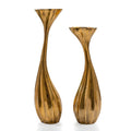 Set of Two Antiqued Gold Aluminum Wavy Faceted Tabletop Pillar Candle Holders on a white background