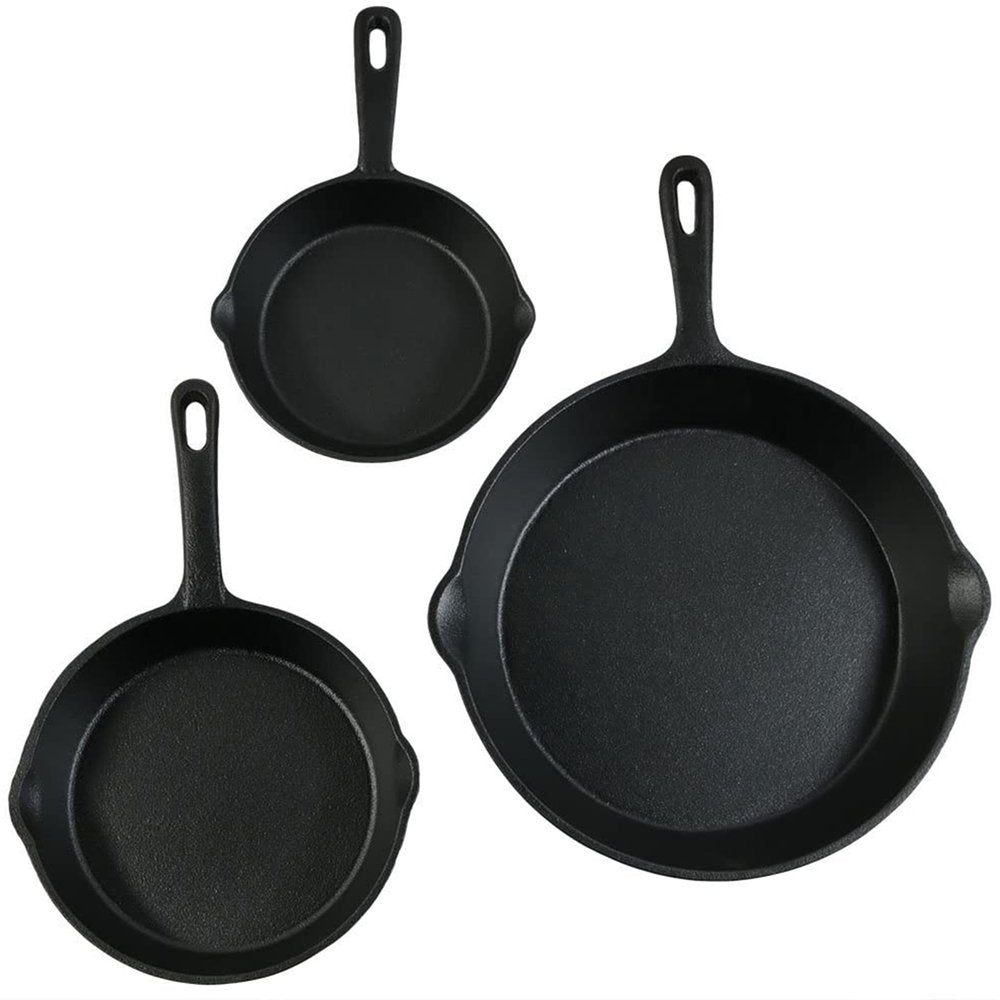 Set of Three Black Cast Iron Frying Pans on a white background