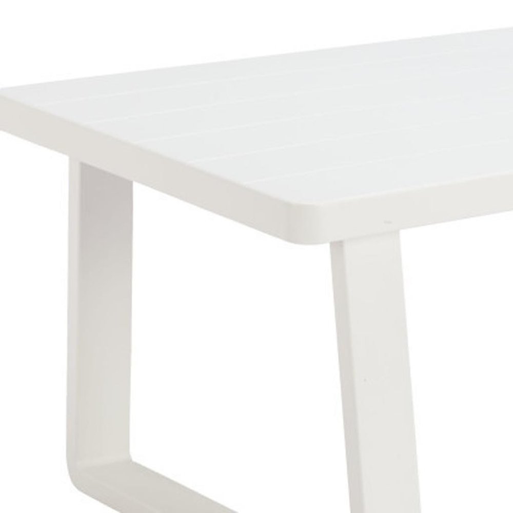 White aluminum outdoor coffee table with slatted top and curved legs, shown against a white background.