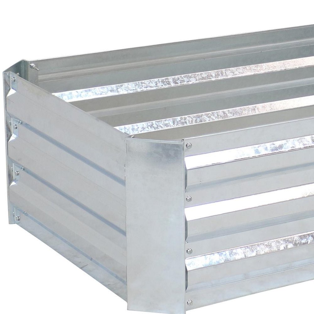 12" X 48" Silver Metal Rectangular Raised Garden Bed. Outdoor planter isolated on a plain white background, finished in silver metal.