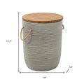 Round gray faux concrete side table with wood lid and rope handles, 17.7" H x 14" W.