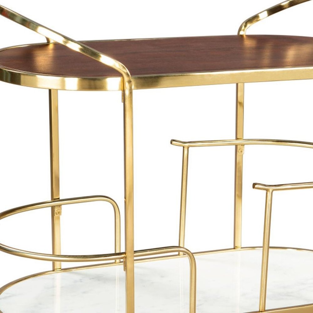 32" Brown Gold And White Iron Solid Wood and Marble Oval Rolling Bar Cart. Bar cart isolated on a plain white background, showing a gold wood surface.