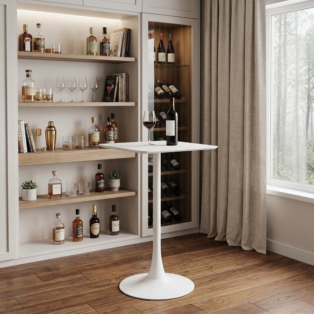 24" White Wood and Steel Square Bar Table styled in a furnished interior with a tan wall on a dark wood floor.