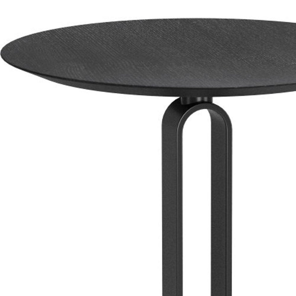 Black rounded bar table with a wood top and a U-shaped steel base against a white background.