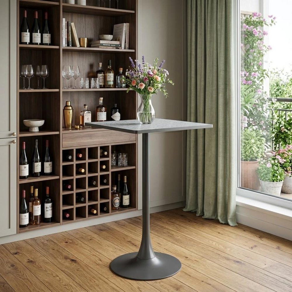 24" Gray and Black Faux Terrazzo and Steel Square Bar Table styled in a furnished interior with a dark brown wall on a wood floor.