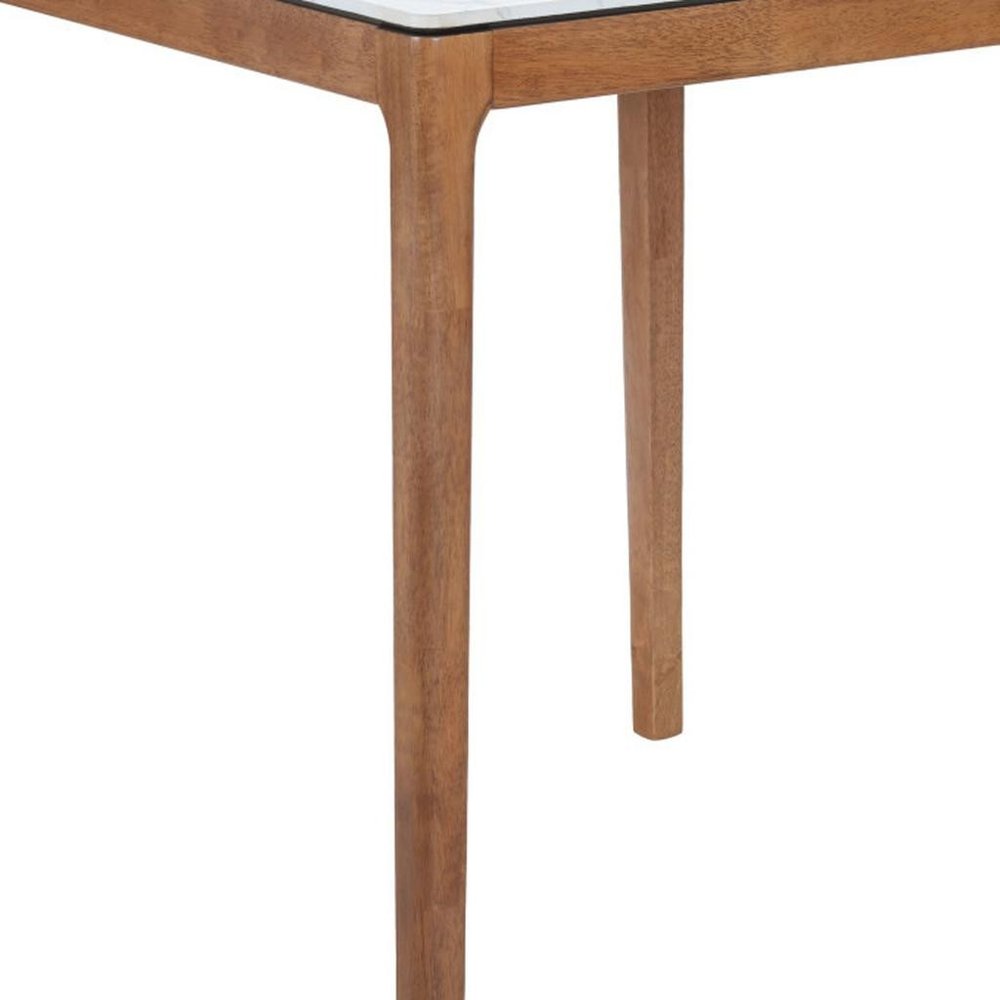 Close-up of a square bar table with a white faux marble top and natural solid wood legs on a white background.