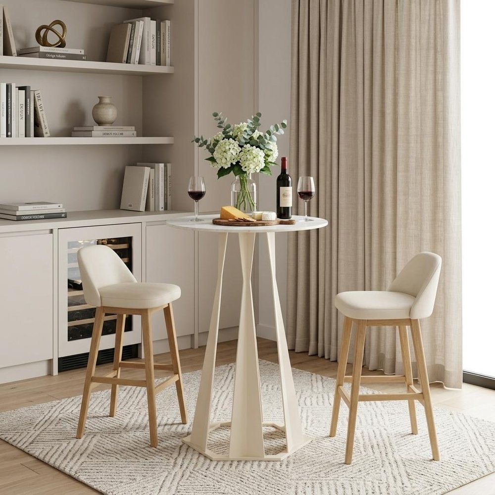 Close-up of 26" White Faux Marble and Steel Rounded Bar Table showing the white metal texture.