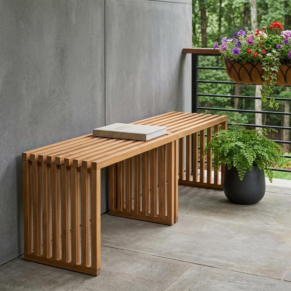 54" Natural Acacia Solid Wood Extendable Garden Patio Bench shown outdoors on a tiled patio with greenery.