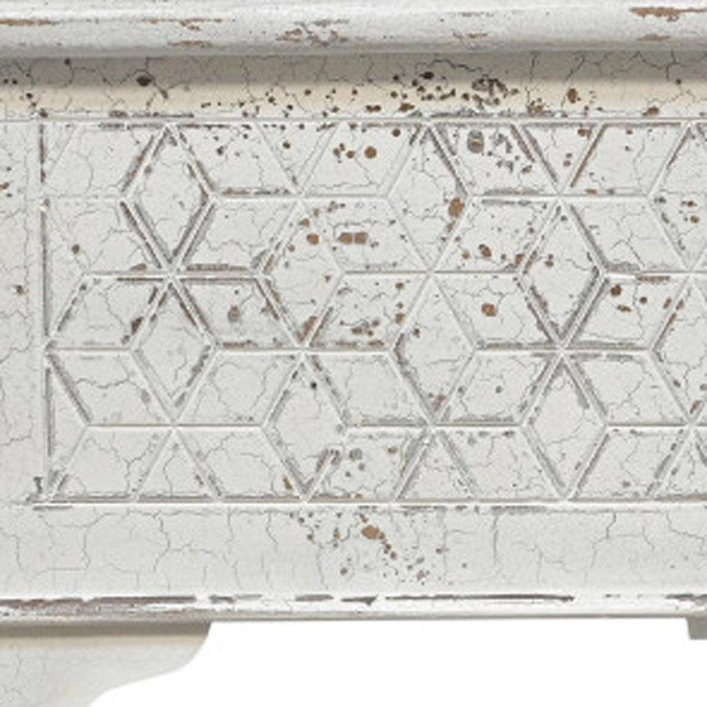 Cropped view of 52" White Solid Wood Geometric Ottoman focusing on the white wood surface.