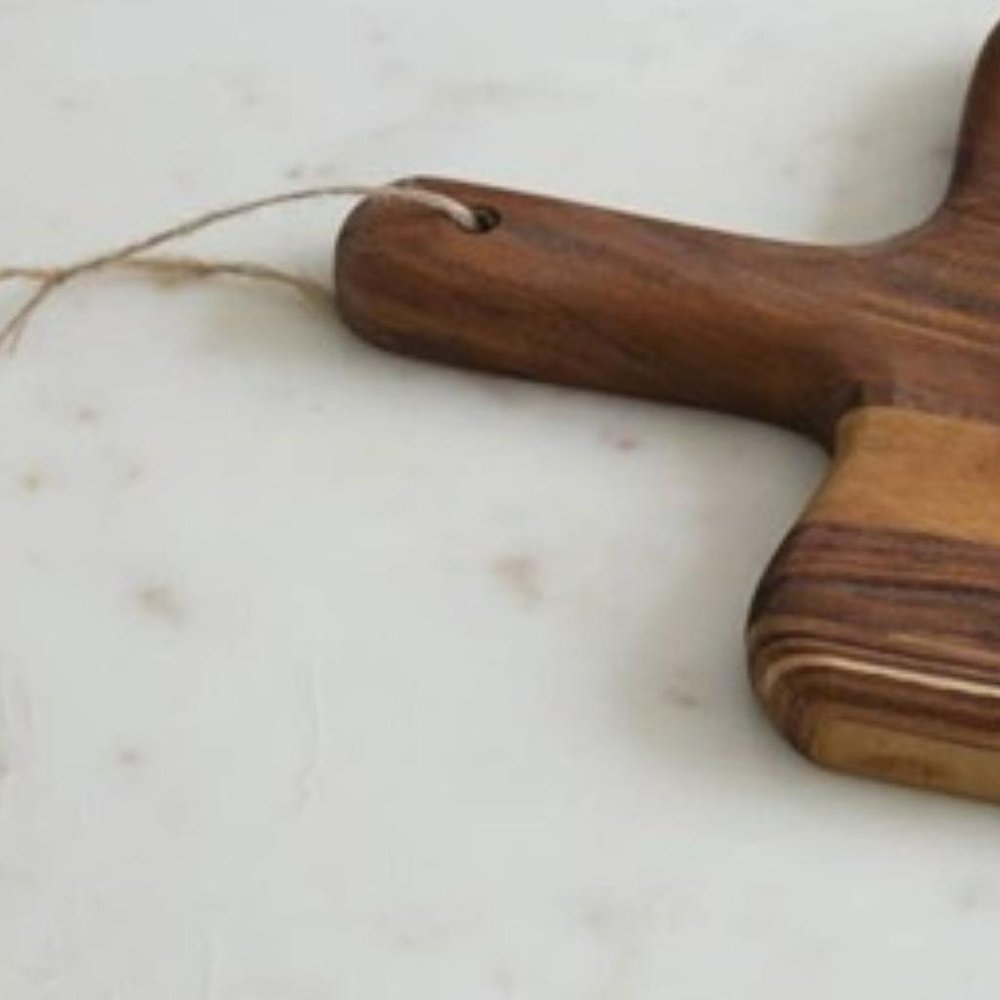 17" Brown Solid Wood Cutting Board. Kitchen accessory isolated on a plain white background, finished in brown wood.