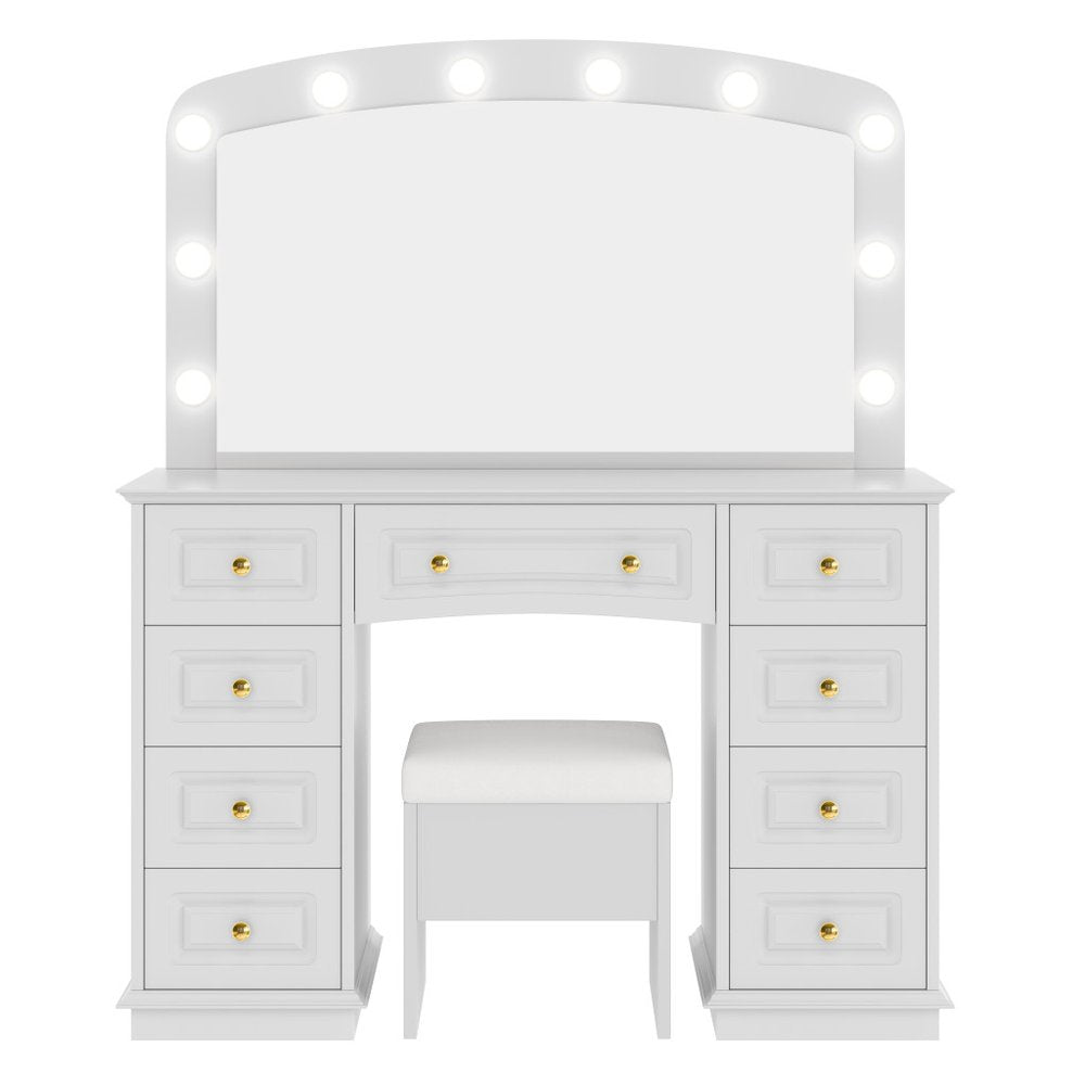 White wood nine-drawer vanity table with a large mirror and illuminated bulbs, including a white stool.