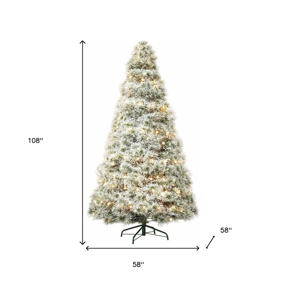 9' White Pre Lit Full Flocked Spruce Christmas Tree on a white background