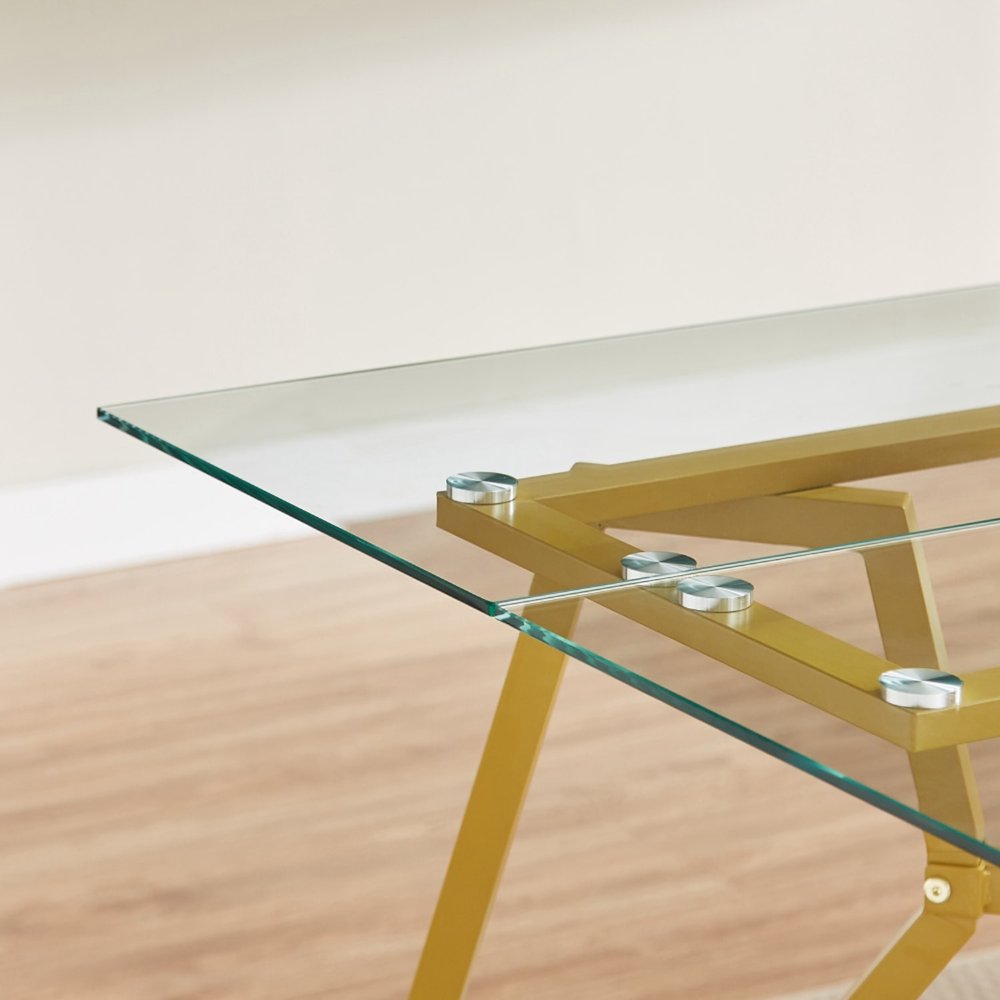 71" White and Gold Glass and Steel Trestle Coffee Table in a home interior