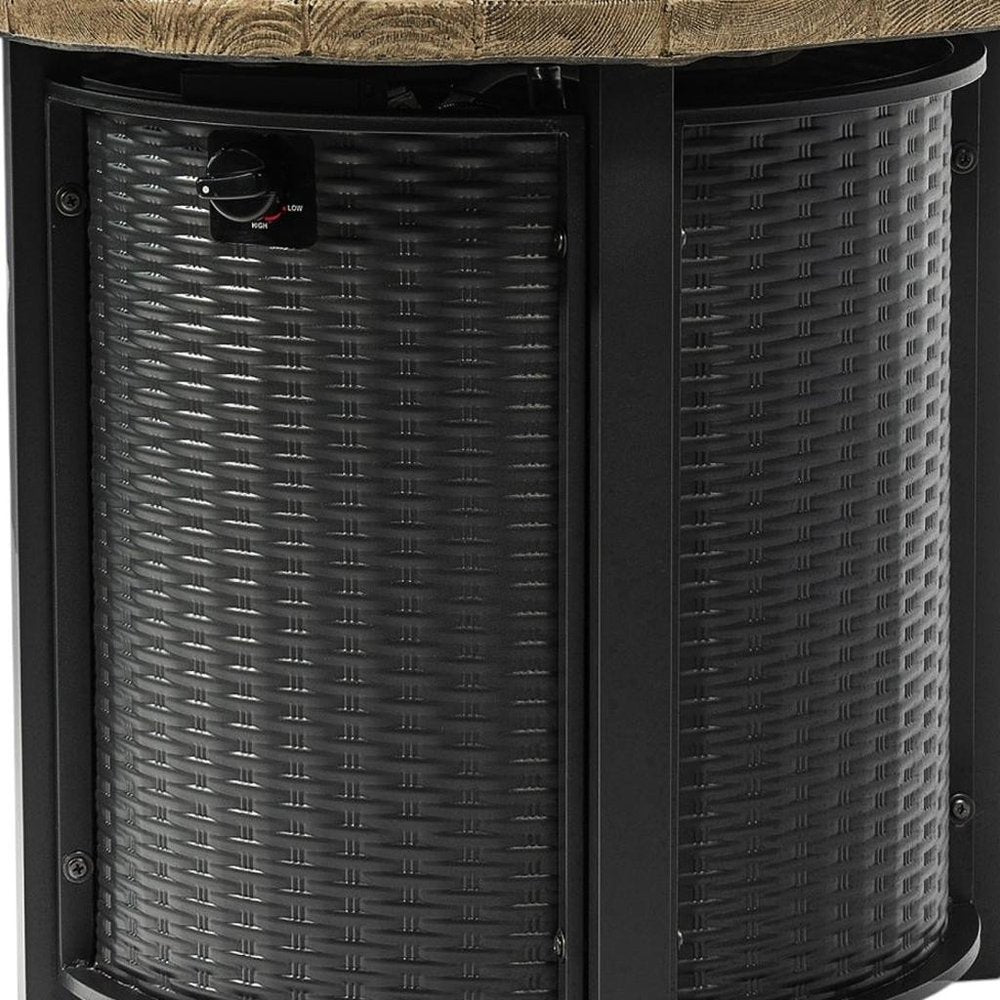 50000 BTU 30" Black And Brown Steel Propane Round Fire Pit photographed against a dark studio background in black.