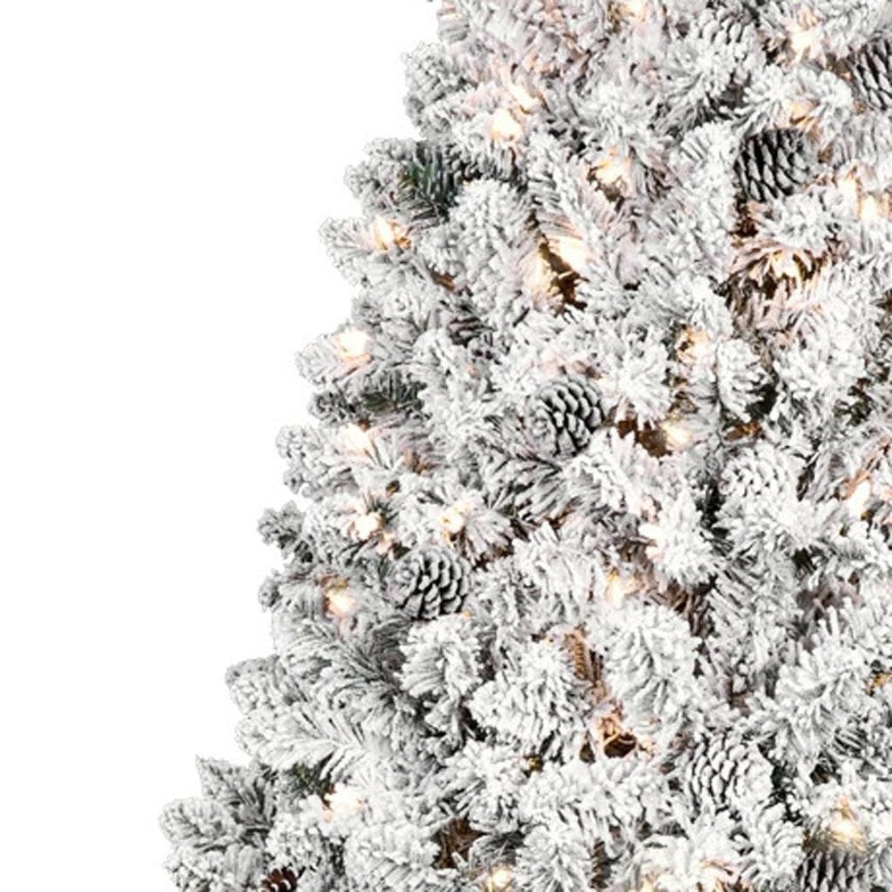 9' Pre Lit Full Flocked Spruce Christmas Tree on a white background