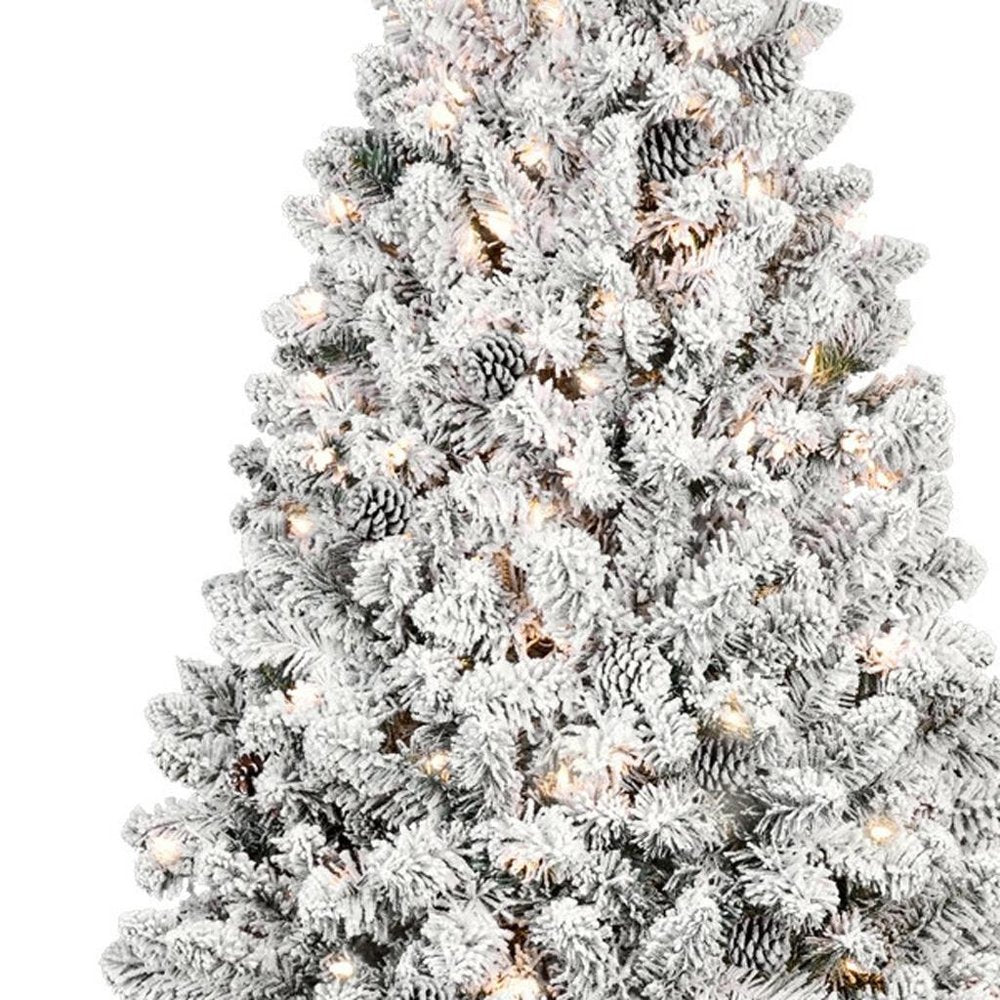 9' Pre Lit Full Flocked Spruce Christmas Tree on a white background