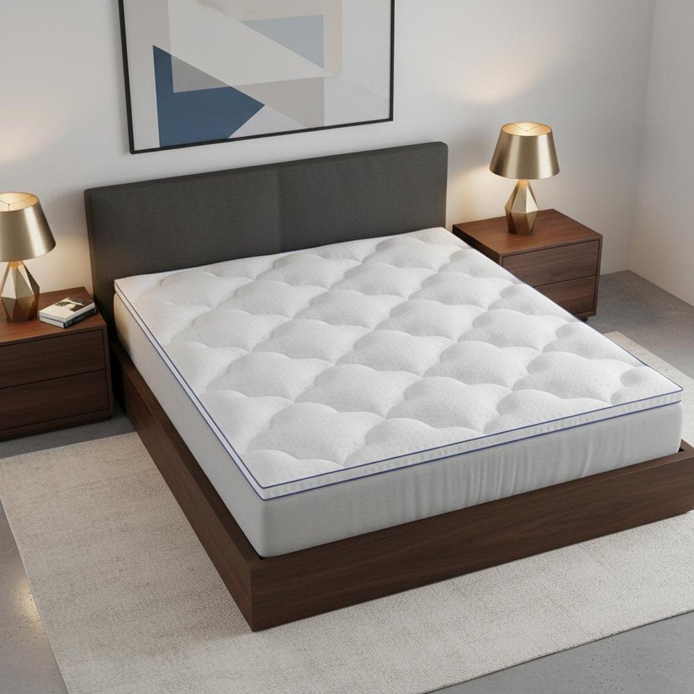 2" White Cotton Queen Mattress Topper. Mattress topper isolated on a plain white background, showing a cotton surface.