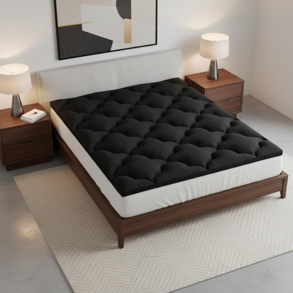 2" Black Cotton California King Mattress Topper. Mattress topper isolated on a plain white background, finished in black cotton.