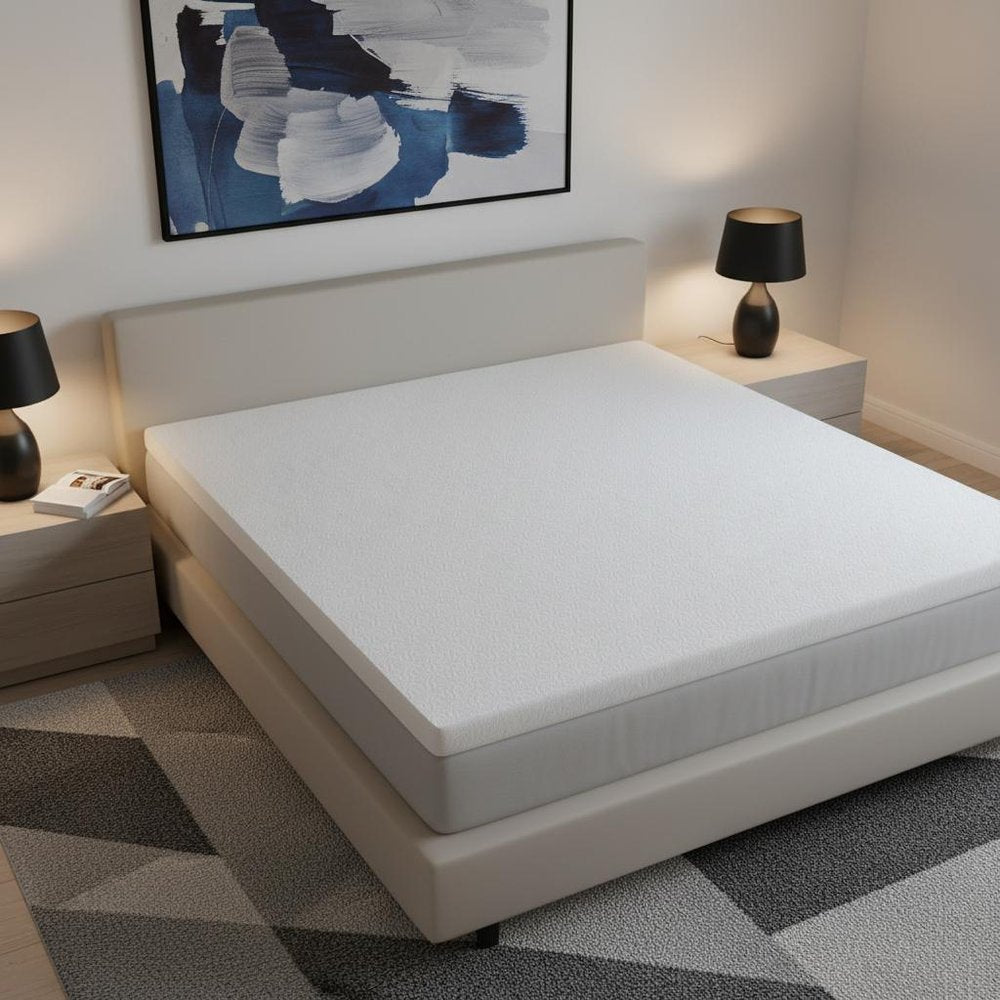 3" White Gel Memory Foam Full Double Mattress Topper styled in a furnished interior with a tan wall on a charcoal floor.