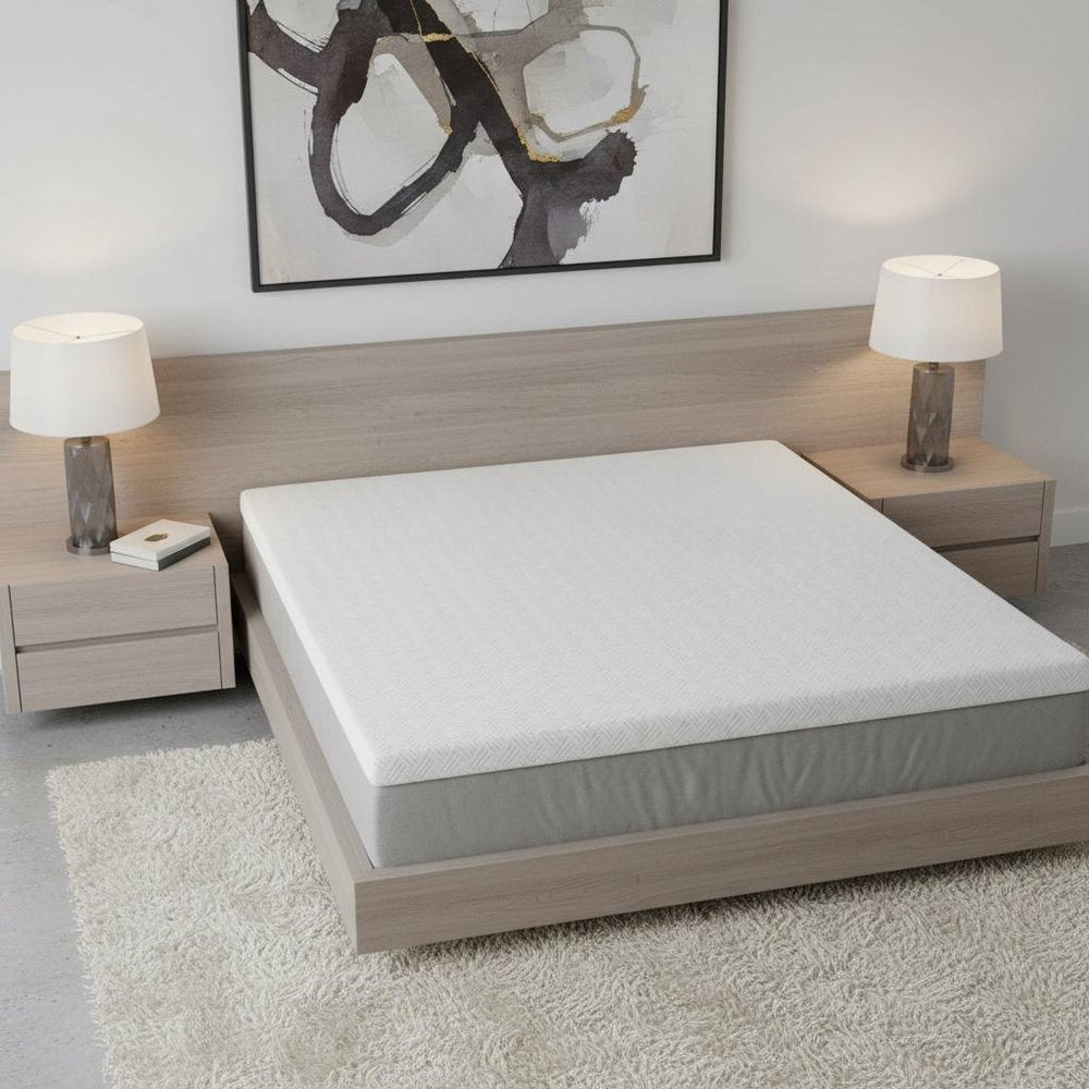 4" White Memory Foam Twin Mattress Topper. Mattress topper isolated on a plain white background, showing its white color.