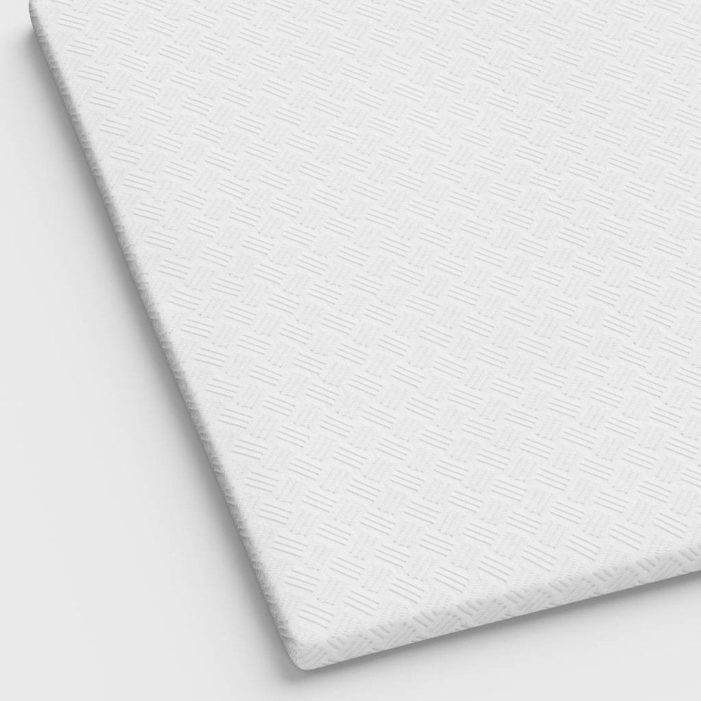 4" White Memory Foam Twin Mattress Topper. Mattress topper isolated on a plain white background, showing its white color.