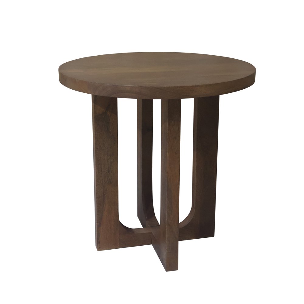 Round brown wood side table with a unique carved base on a white background.