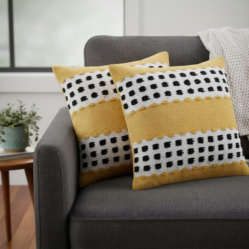 Set of Two 20" Yellow Black And White Striped Cotton Throw Pillows in a home interior