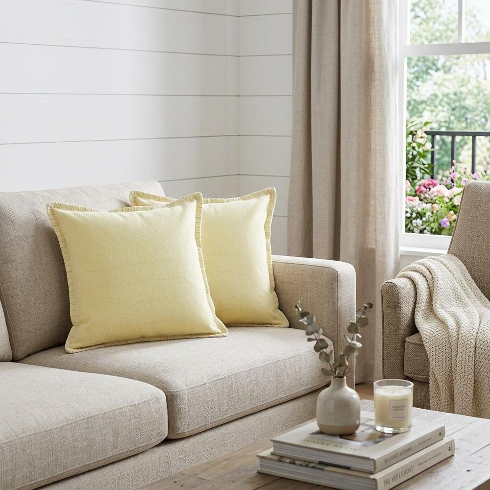 Set of Two 20" Yellow Cotton Throw Pillows in a home interior