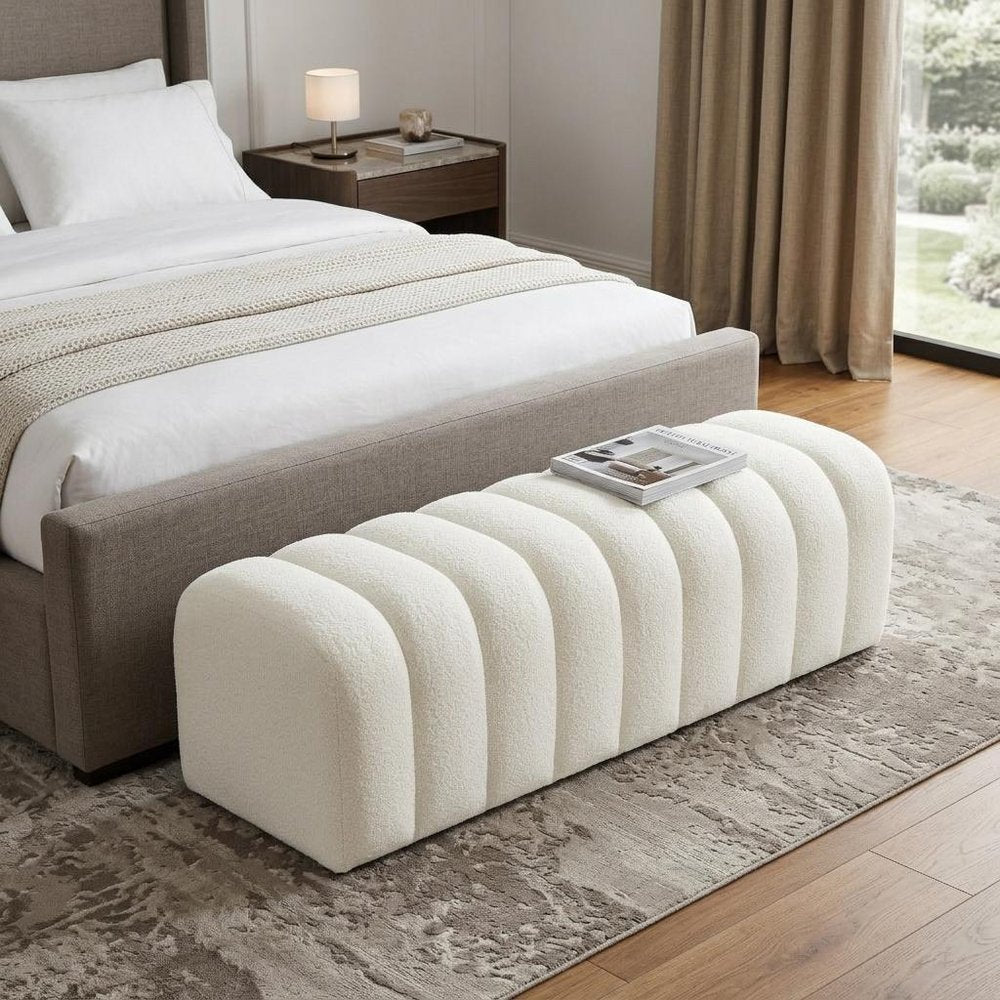59" White Tufted Boucle Upholstered Bench styled in a furnished interior with a gray wall on a wood floor.