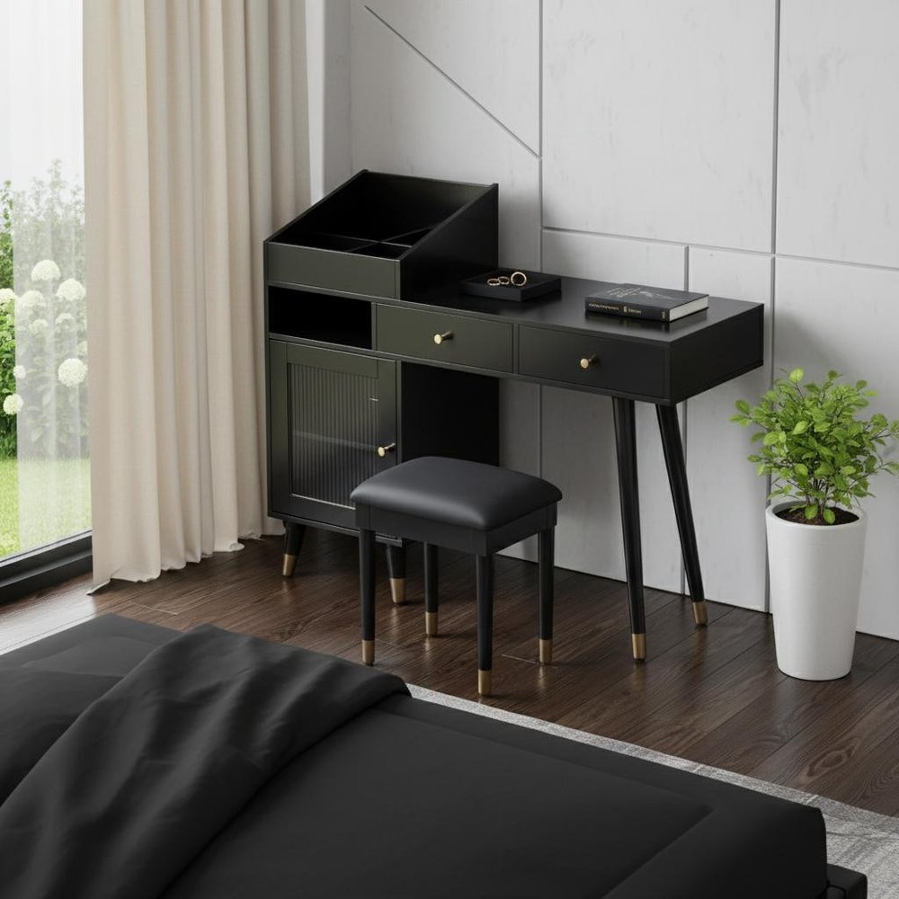 44" Black Wood Two Drawer Vanity Table styled in a furnished interior with an off-white wall on a black floor.