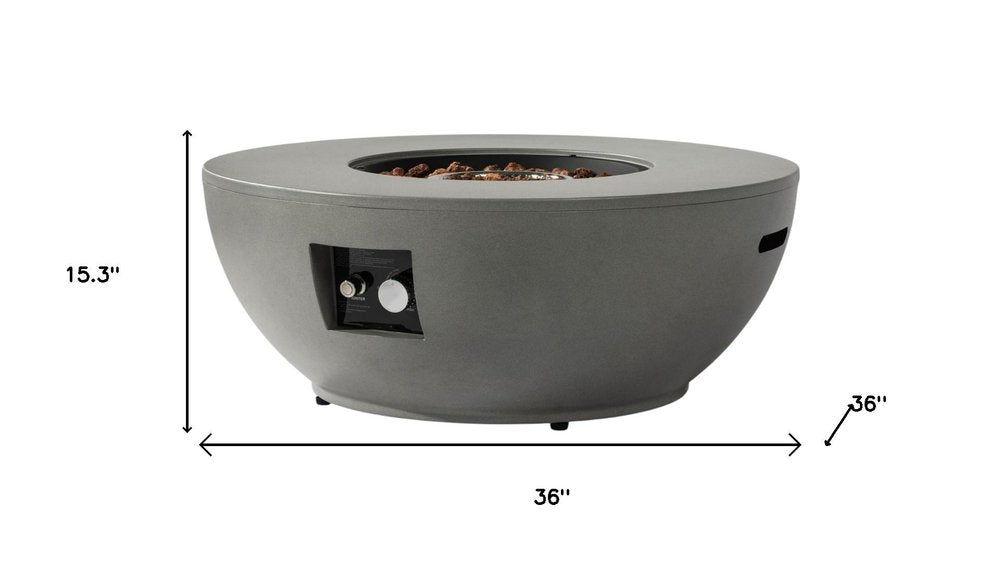 50000 BTU 36" Gray Steel Propane Round Fire Pit With Cover. Outdoor fireplaces and firepit isolated on a plain white background, finished in gray metal.