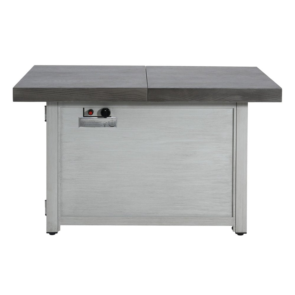 Rectangular propane fire pit with gray aluminum top and whitewashed wood base, featuring control knobs and a red ignition button.