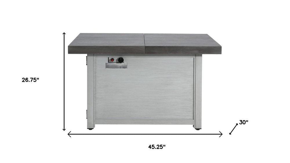 50000 BTU 45" Gray Aluminum Propane Rectangular Fire Pit With Cover. Outdoor fireplaces and firepit isolated on a plain white background, finished in gray metal.