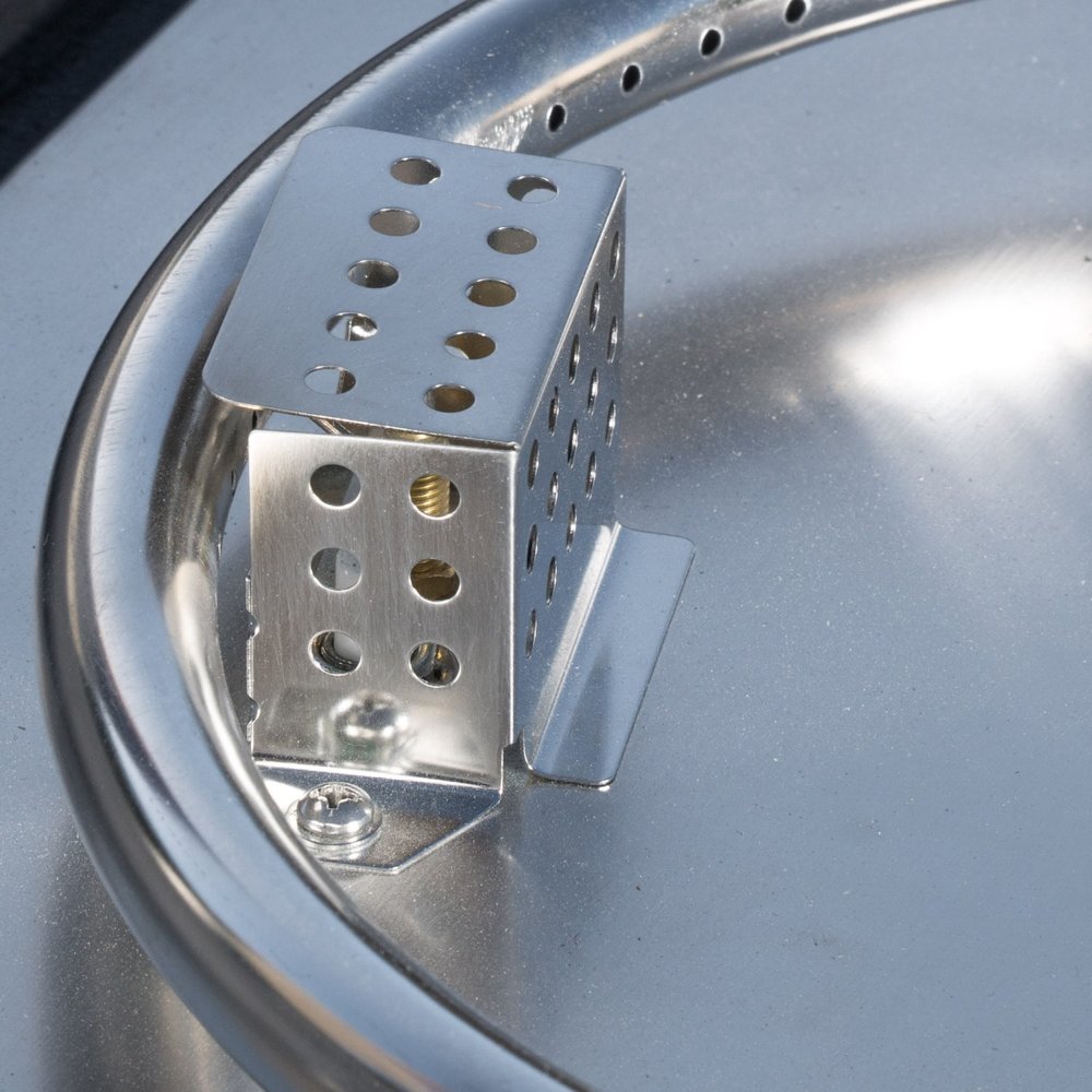 40000 BTU 32" Gray Steel Propane Rectangular Fire Pit With Cover shown outdoors on a patio.
