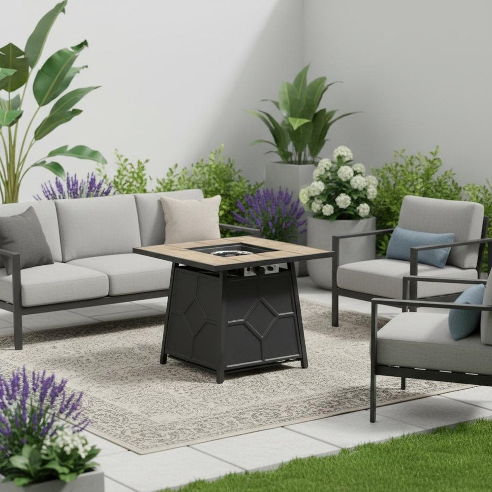 40000 BTU 28" Brown Iron Propane Square Fire Pit With Cover shown outdoors on a patio with greenery.