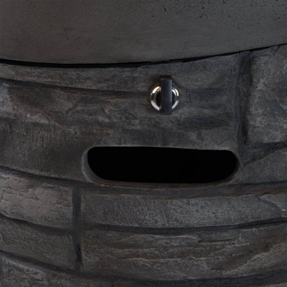 32000 BTU 26" Gray Magnesium Oxide Propane Round Fire Pit With Cover close-up highlighting the gray surface.