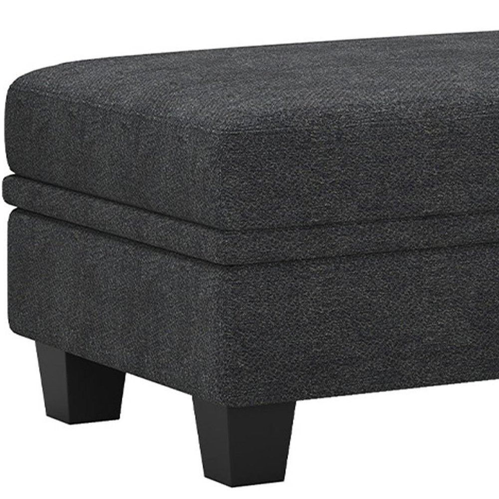 46" Beige And Black Chenille Ottoman With Storage. Ottoman isolated on a plain white background, in a black finish.