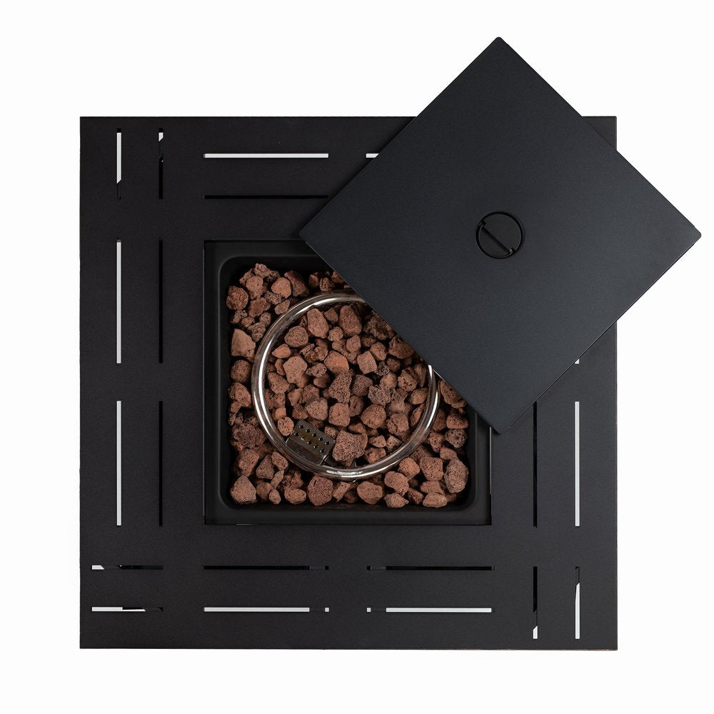 Black steel square fire pit table with lava rocks and a black lid on a white background.